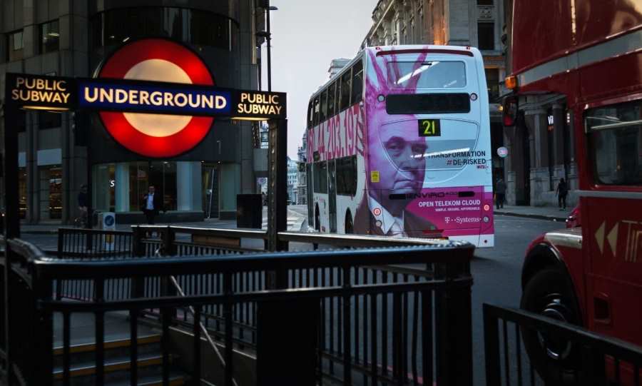 The the first bus was wrapped with an ad display covering the Number 21 route.