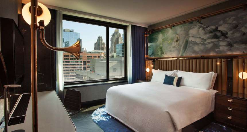 A signature guestroom at Hotel EMC2 in Chicago. 