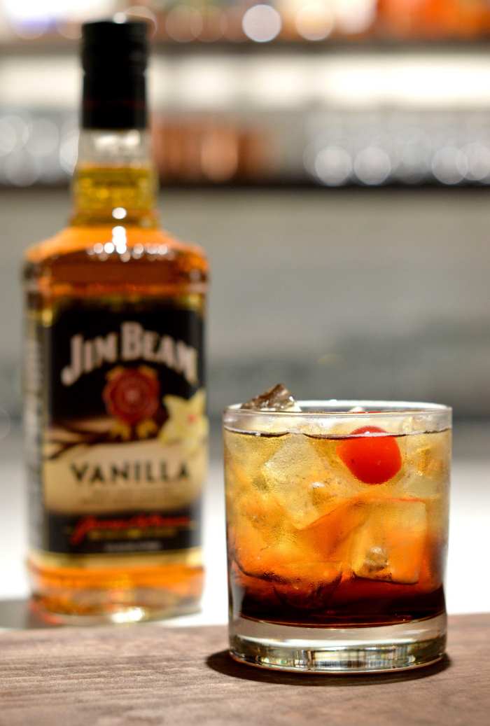 The new Jim Beam Vanilla with cola and a cherry garnish. 