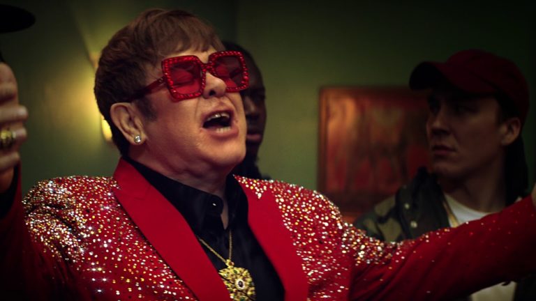 Elton John Enters the Rap Scene in New Snickers Ad