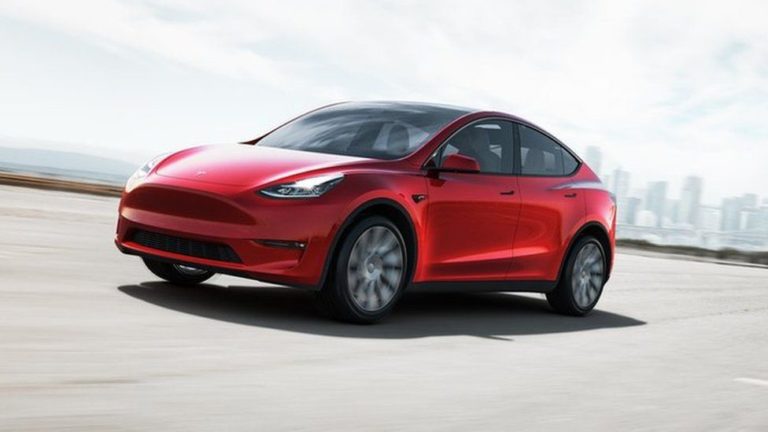 Tesla reports record sales and profits