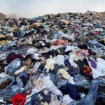 pile of fast fashion clothes affecting the environmental