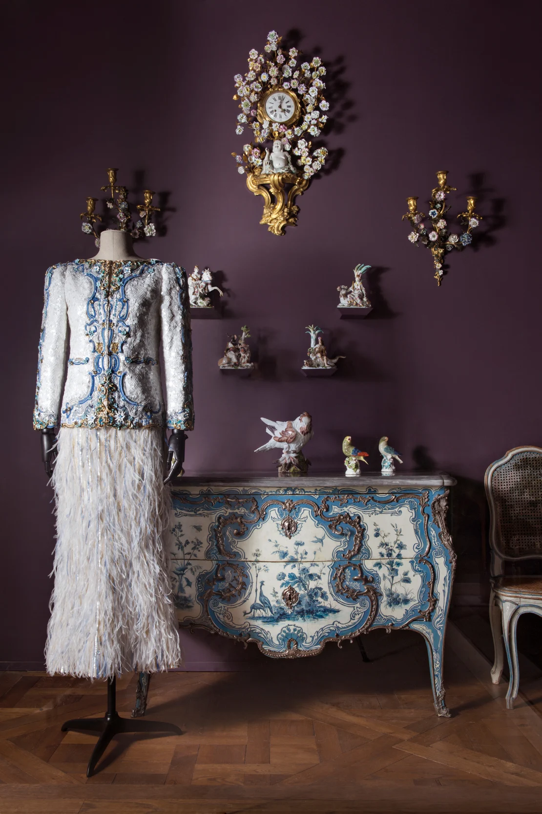 Karl Lagerfeld drew inspiration from an ornate blue and white cabinet. Image source: Nicolas Matheus/Musée du Louvre via CNN