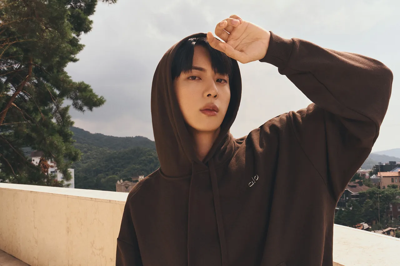 Jin, the Global Ambassador for Alo, is featured in the brand's "Wellness Begins with Self-Love" campaign, showcasing a range of styles.. Image source: ALO YOGA